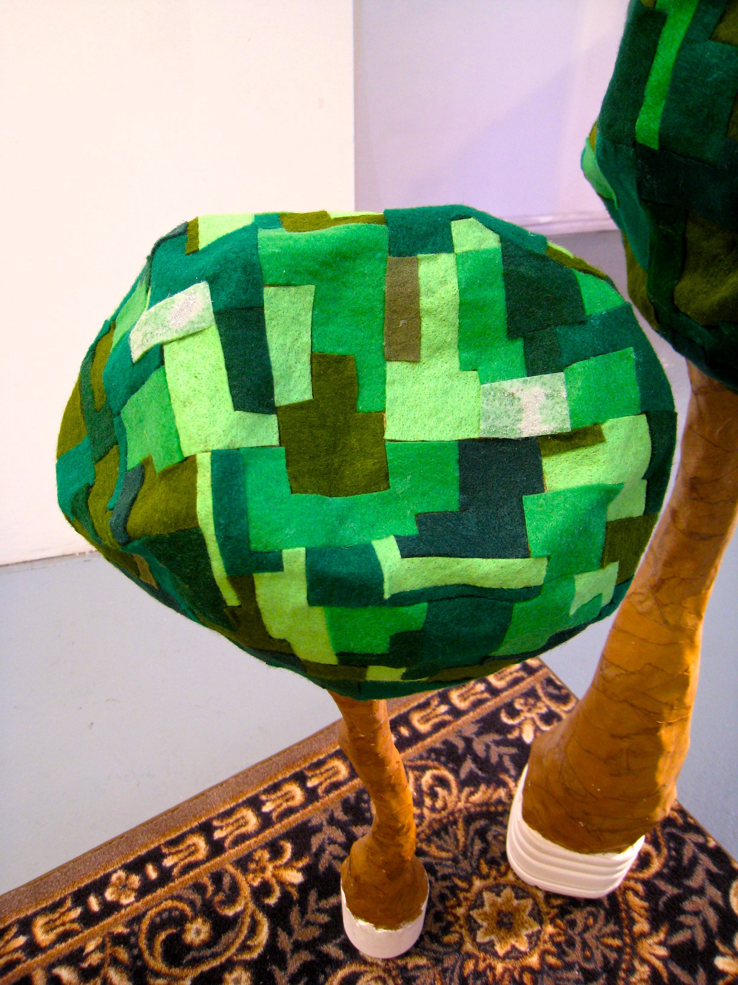 Subliminal Rapture Rug, 2010 detail: felt ‘farmland patchwork’ trees, paper mache, plaster base