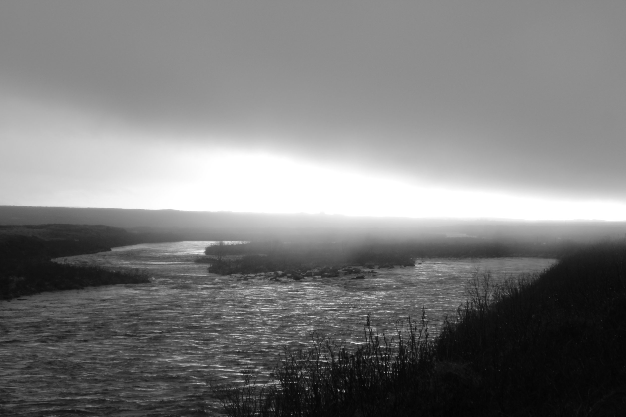 Twilight Slips Past the River