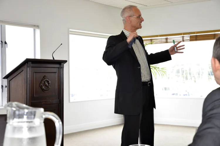 Mikal speaking at the Admirals Breakfast Club in Auckland, New Zealand