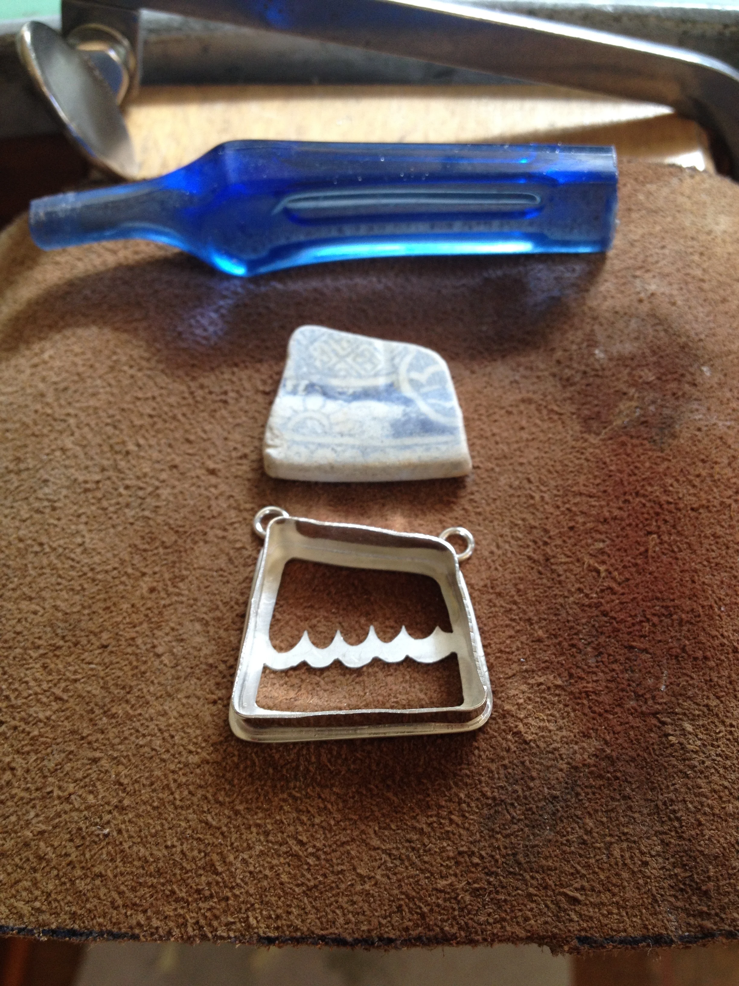 Getting ready to set this piece of sea pottery.