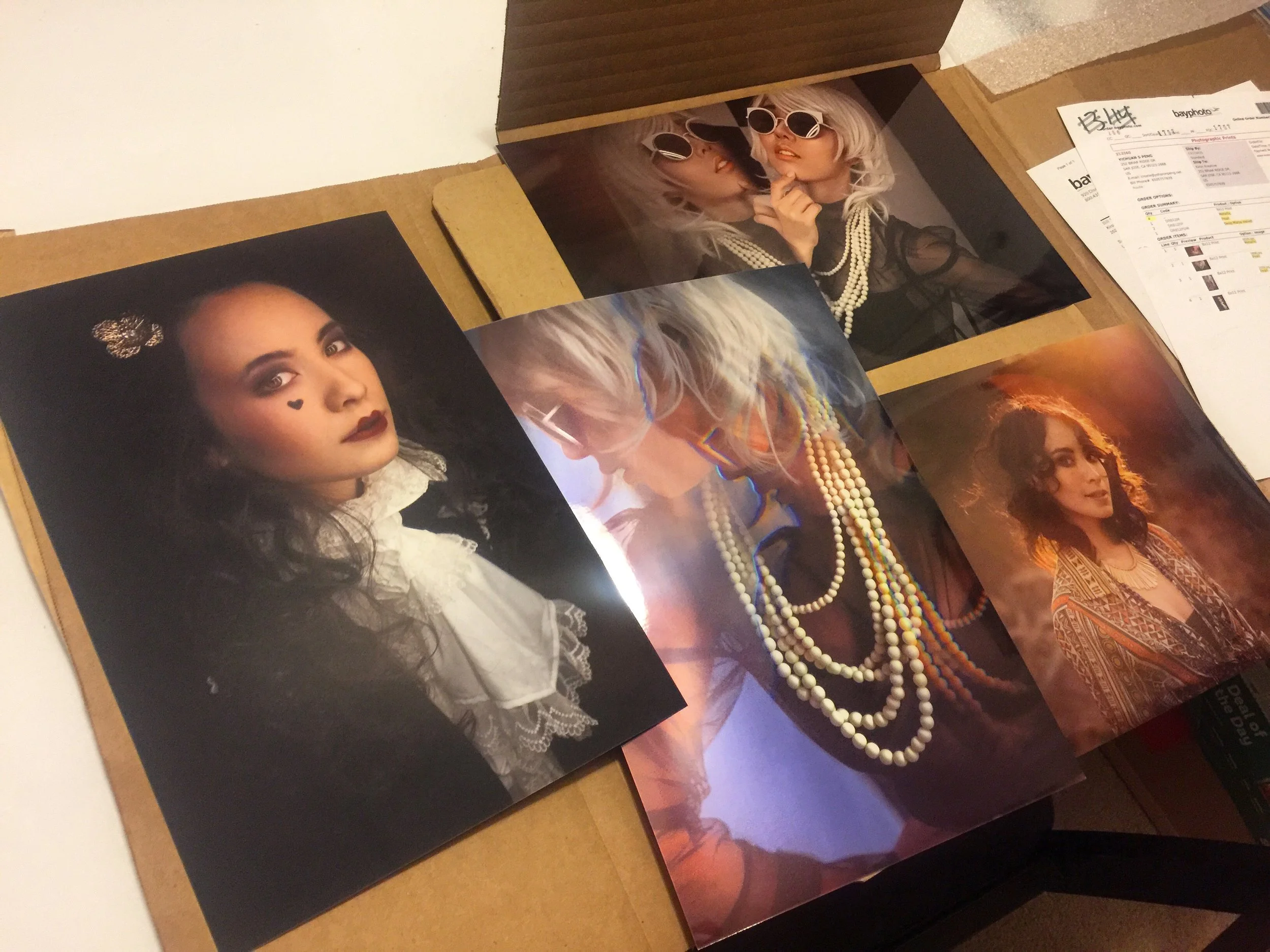 a spread of fashion photo prints of various moods & stylings