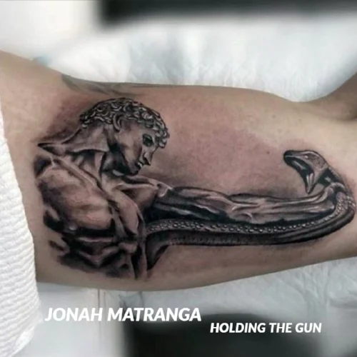 holding the gun jonah.jpg