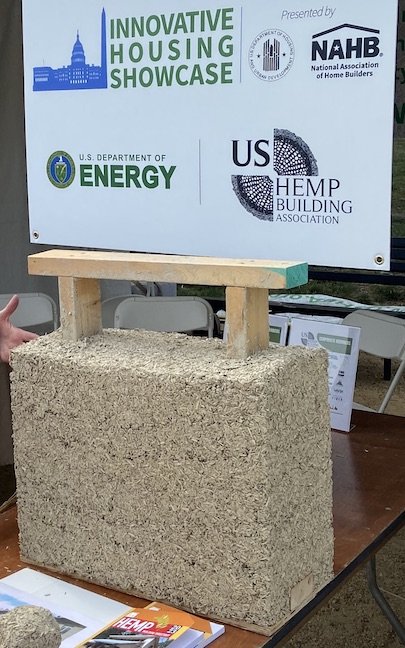  A hemp-lime block on display at USHBA’s table.   Photo by Michael Sirak  