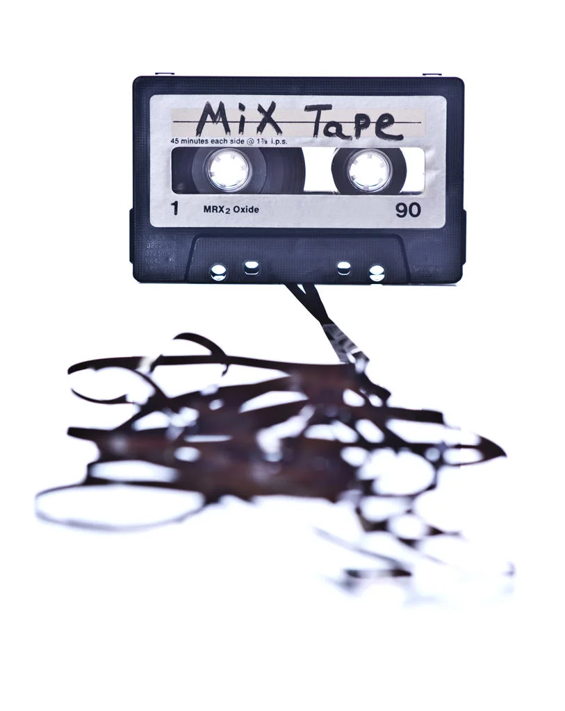 (ts427) a mix tape spilling out white background.jpg