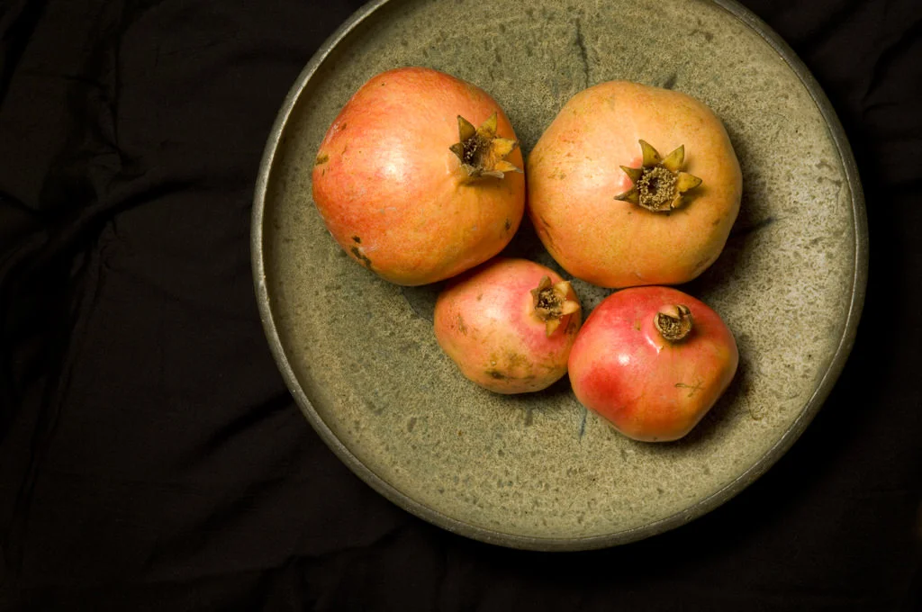 (ts383) four pomegranates in a bowl.jpg