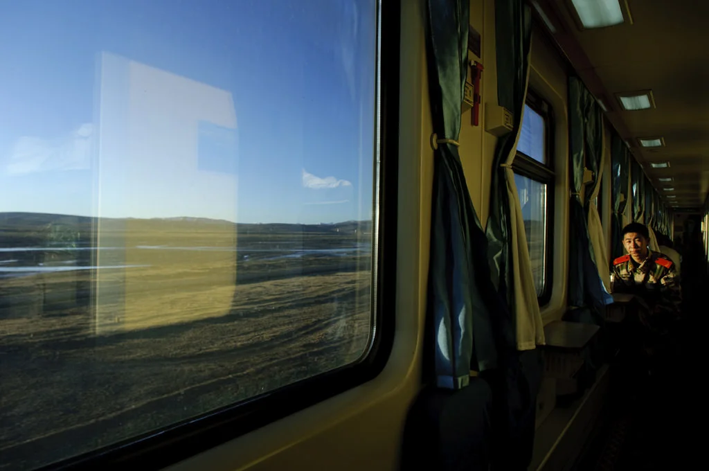 (216) a soldier in a train, tibet, china.jpg
