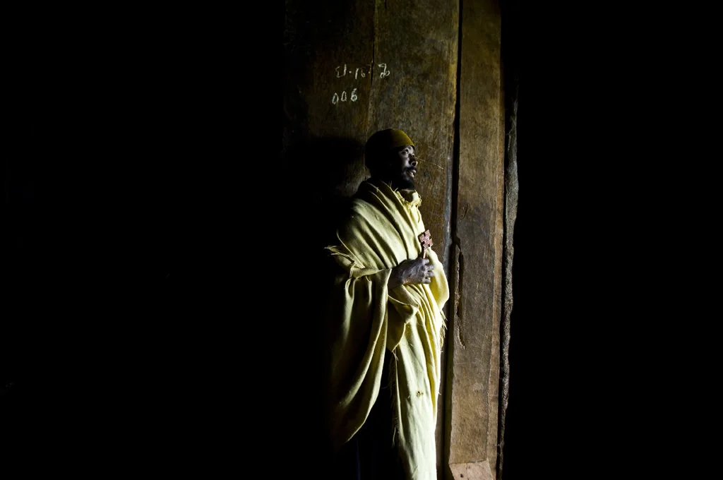 (168) a priest in a church, lake tana, ethiopia.jpg