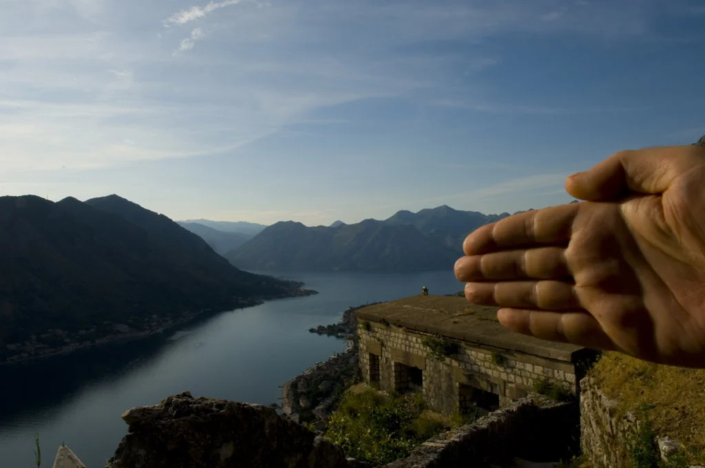 (159) a hand over the straight of kotor, montenegro.jpg