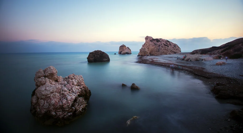(ts1241) aphrodites rock beach in cyprus by dusk.jpg