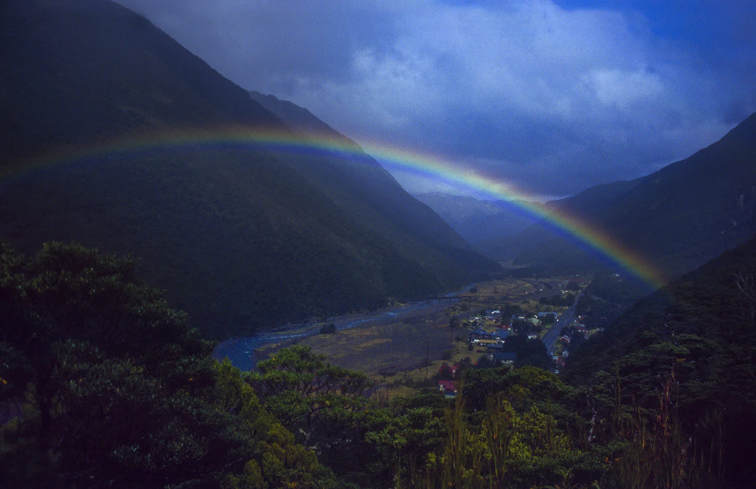 (ts481) a rainbow over arthur pass, new zealand.jpg