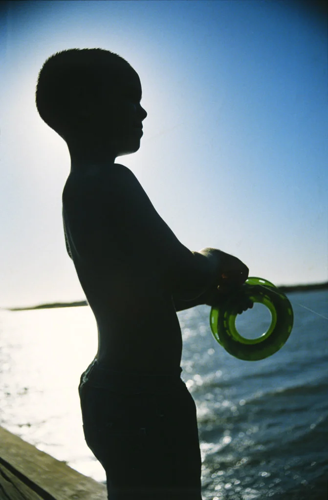 (99) a boy fishing in carnavron, australia.jpg