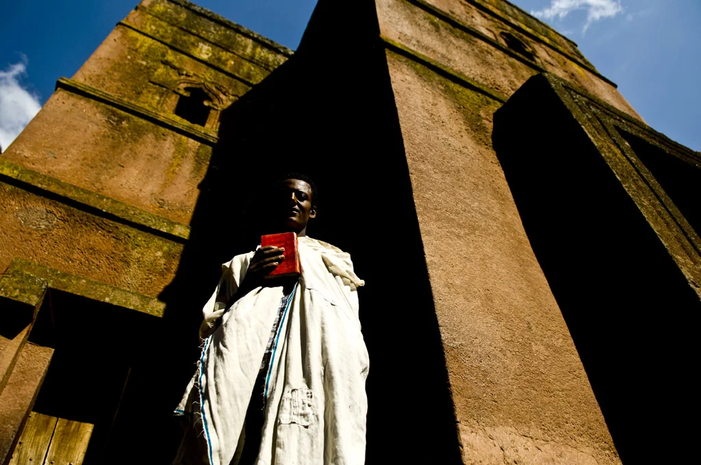 (174) a scholar under a church, lalibela, ethiopia.jpg