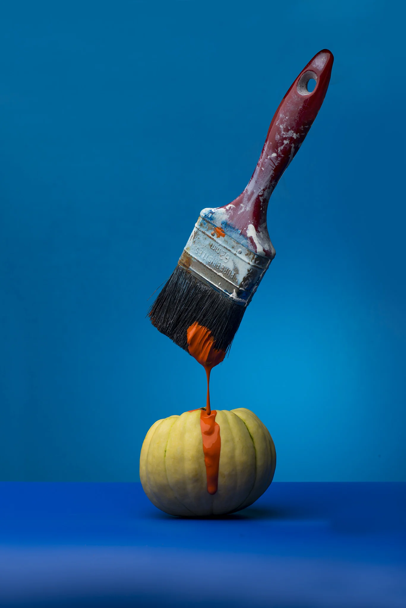painting a pumpkin in orange.jpg