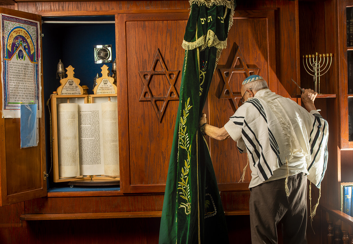 an old man in a synagogue, tivon israel.jpg
