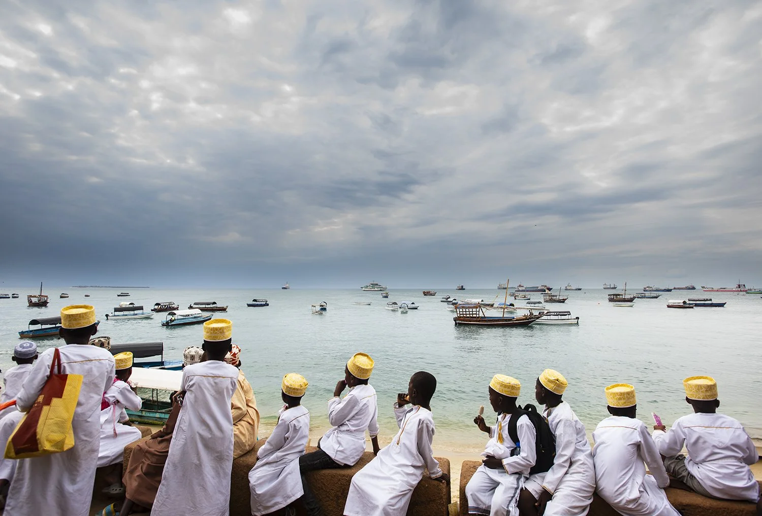 children at the waterfront, stone town zanzibar.jpg