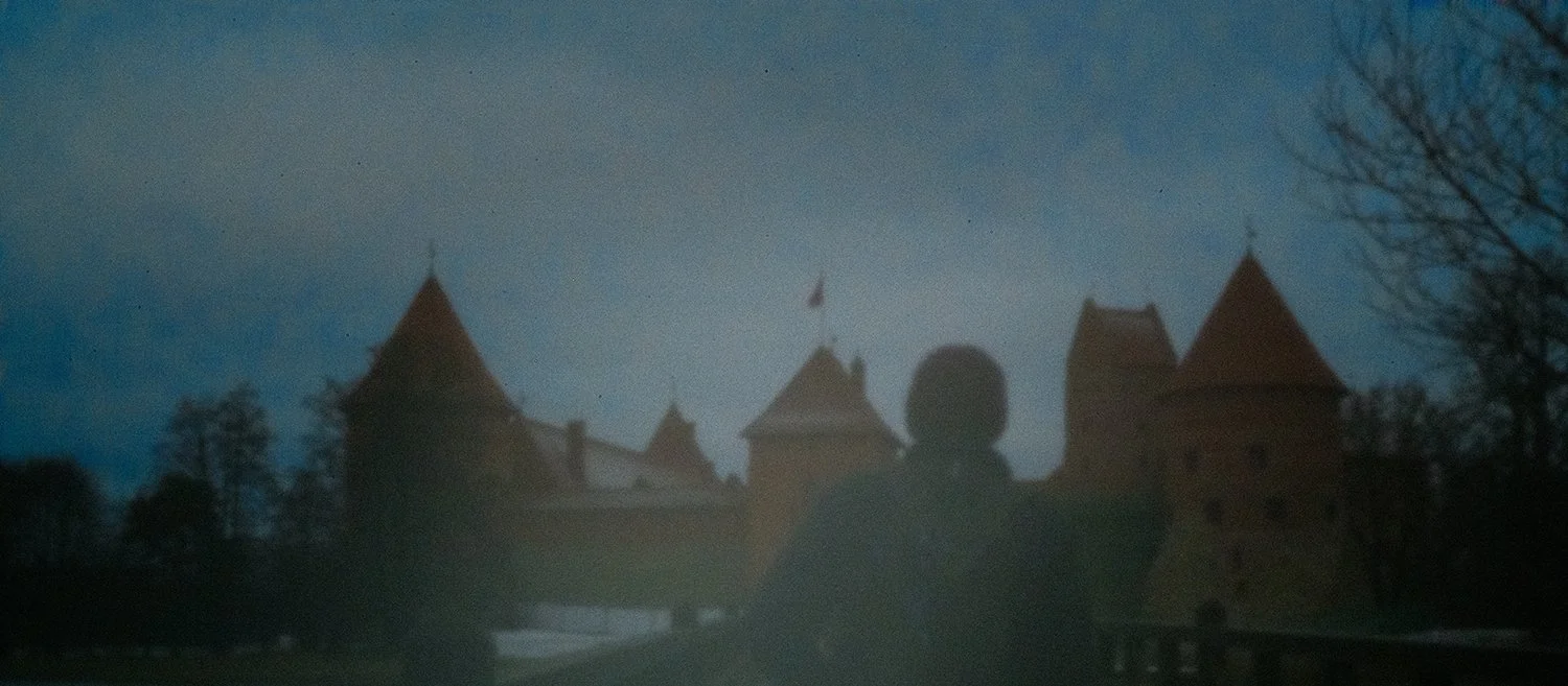 man in trakai castle, Lithuania, camera obscura.jpg