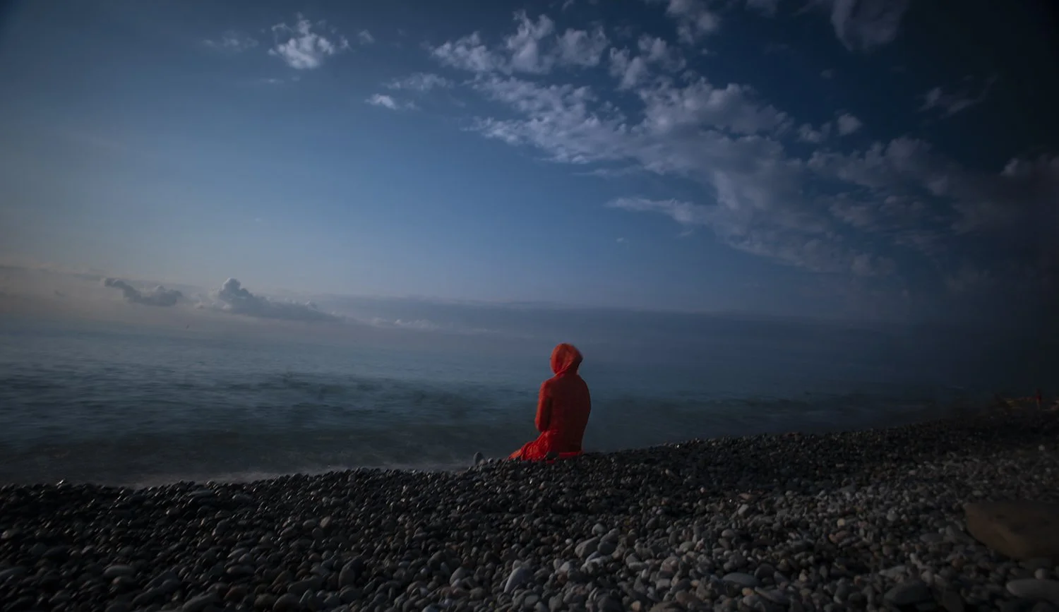 woman in red by the sea, batumi georgia.jpg