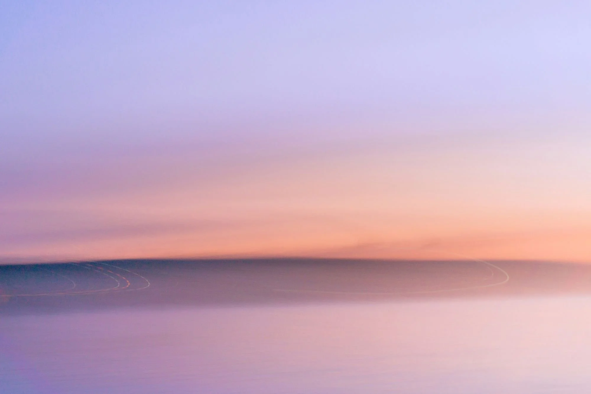Ocean in sunset as background for certified hypnotherapist anxiety specialist Sheila Gallien.
