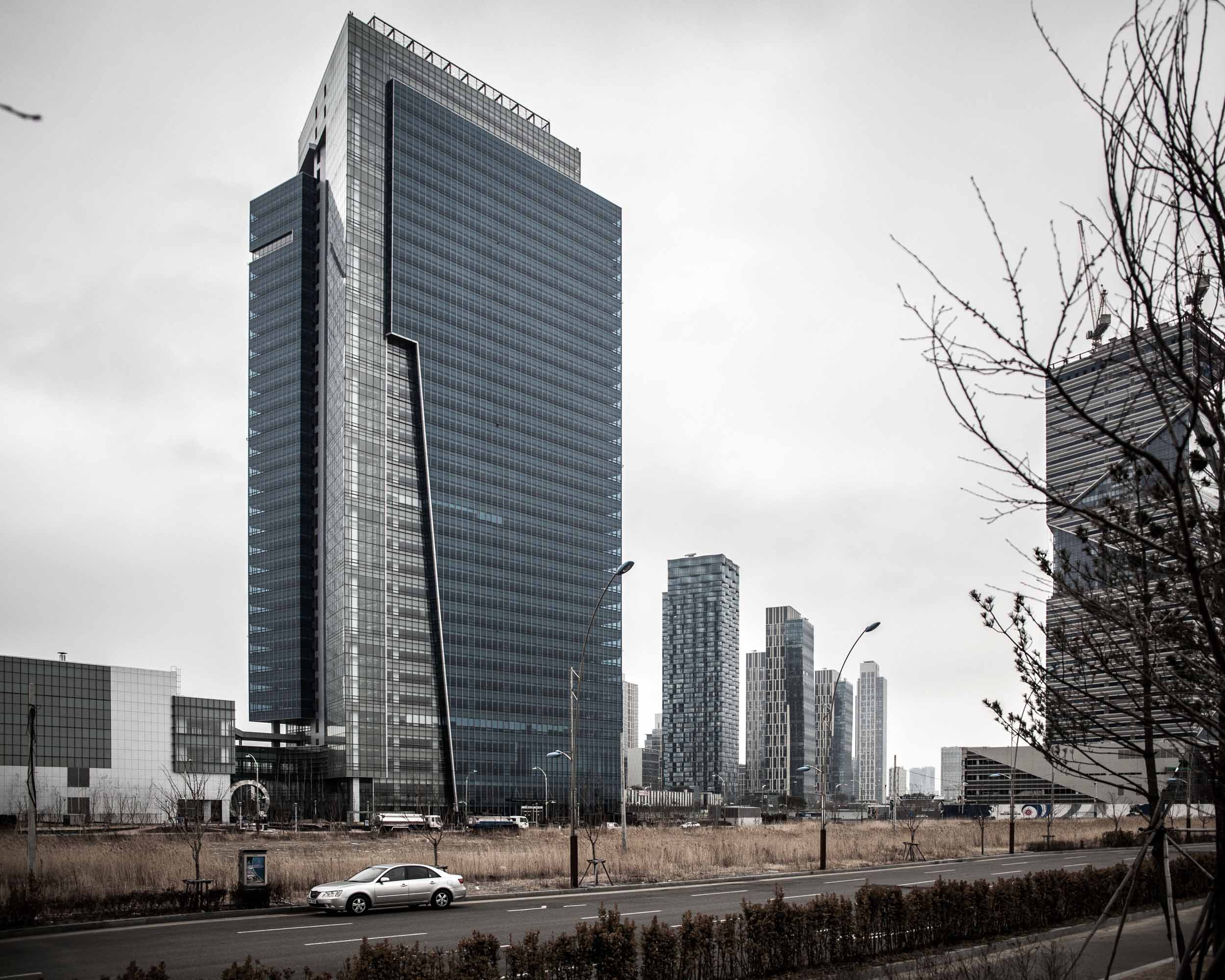  Songdo International Business District (SIBD) is a new Smart City or Ubiquitous City built from scratch on 1,500 acres of reclaimed land along Incheon's waterfront, &nbsp;40 miles southwest of Seoul, South Korea and connected to Incheon Internationa
