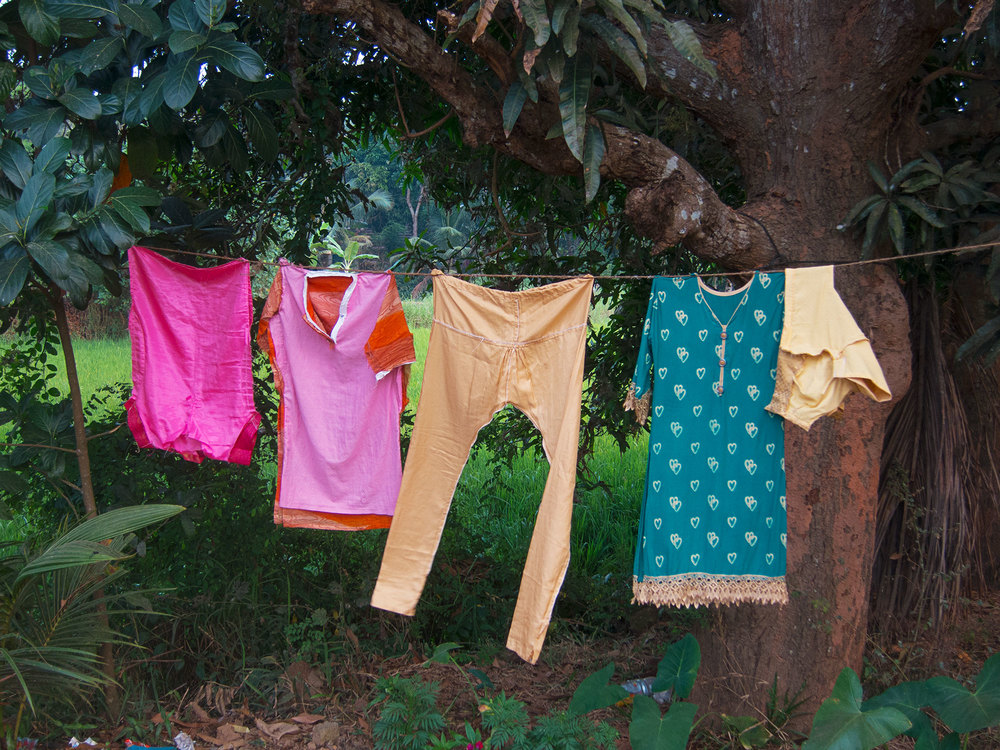 Some colorful laundry hanging up to dry.