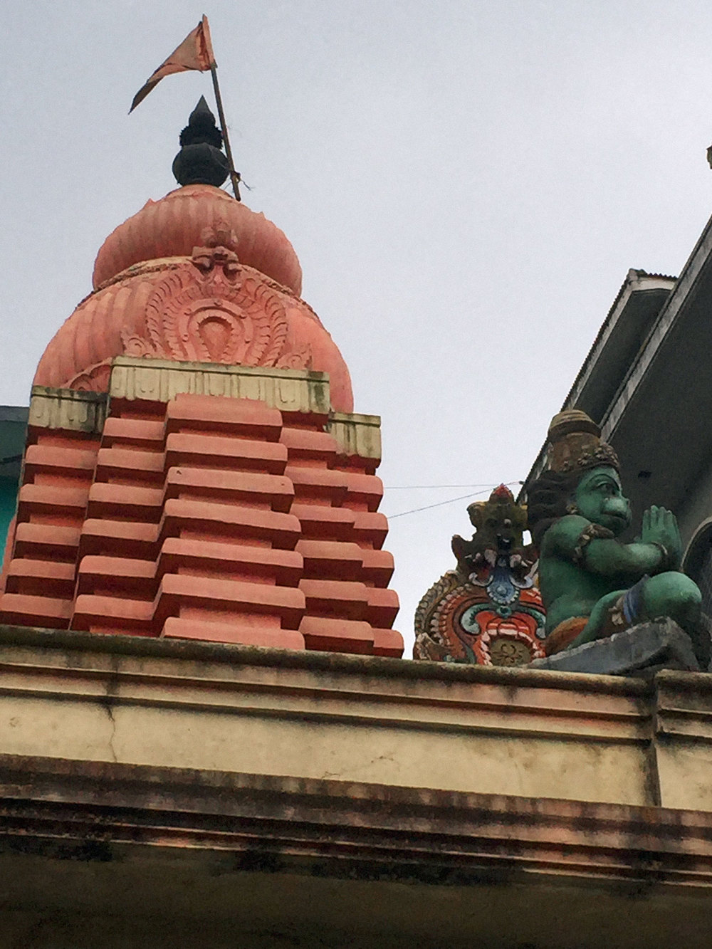 Another angle of the small Krishna temple. I like the 'Hulk' green Hanuman in the namaste pose on the corner.