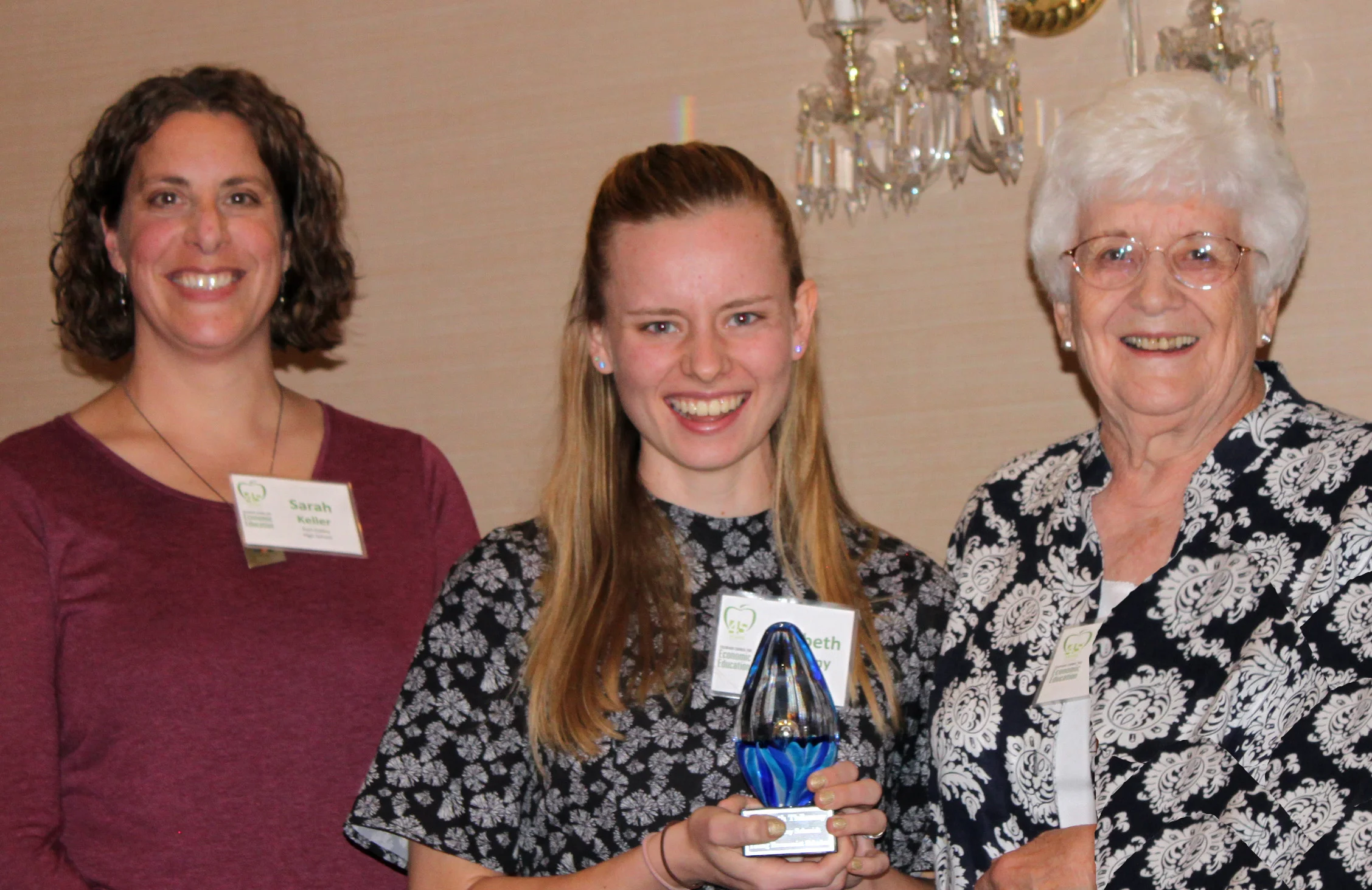 Sarah Keller, teacher; Elizabeth Thilmany, winning student; and LaKay Schmidt, founding CCEE President