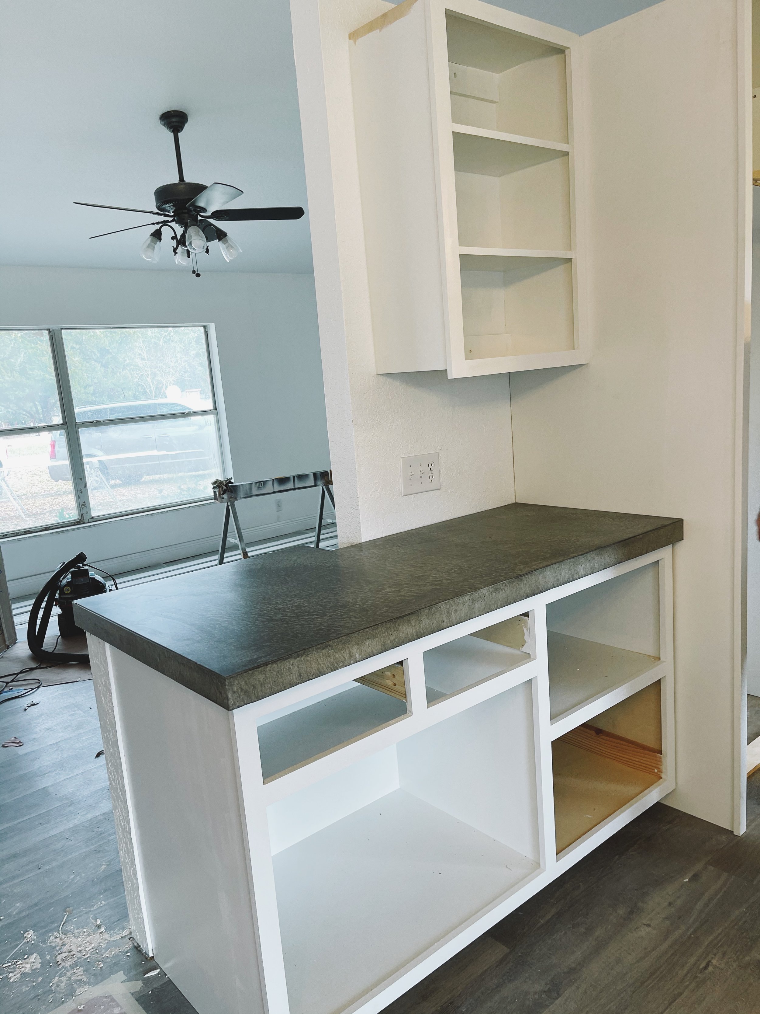 Modern kitchen renovation custom concrete island 