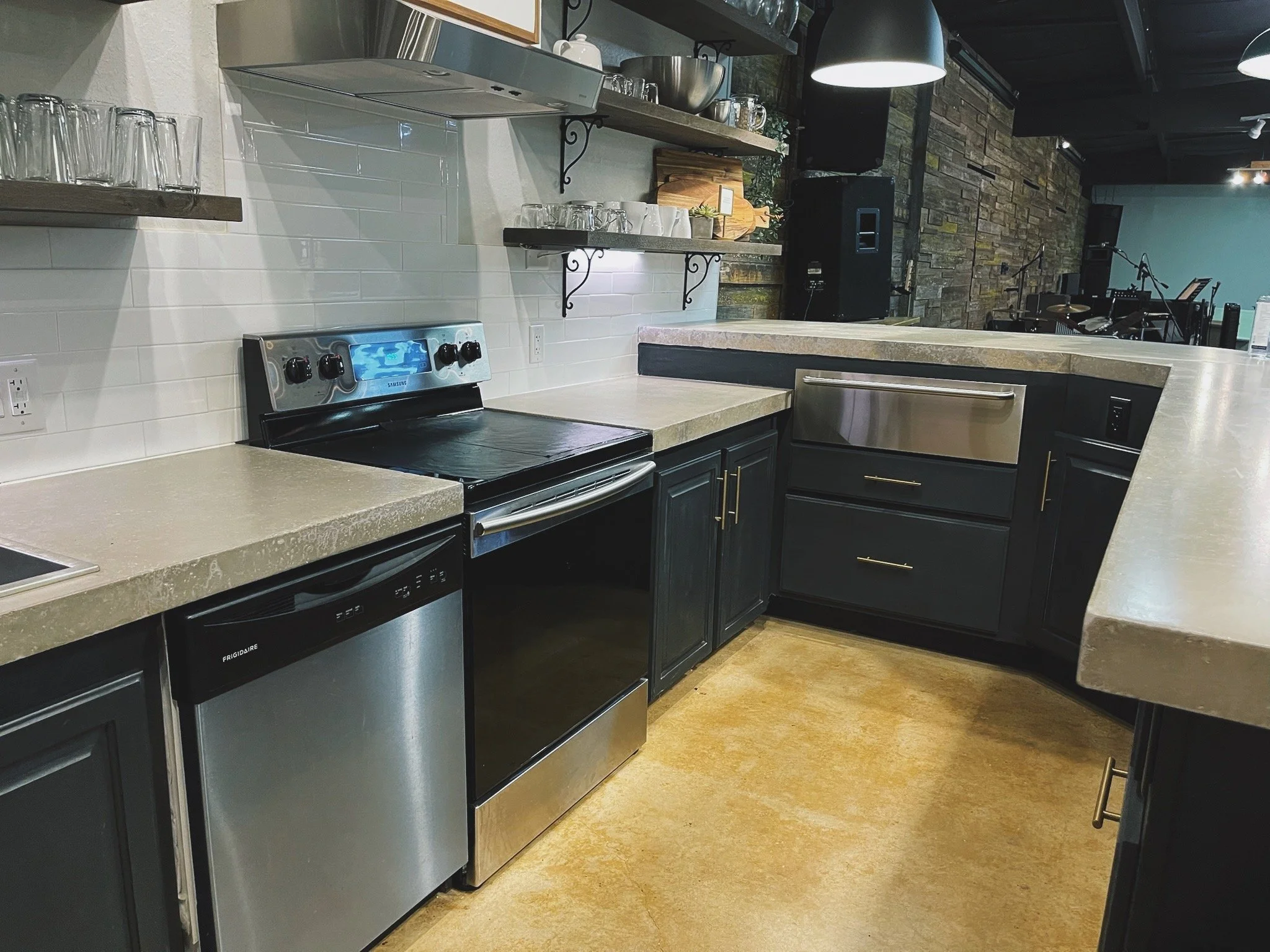 Custom countertop, concrete island, kitchen renovations 