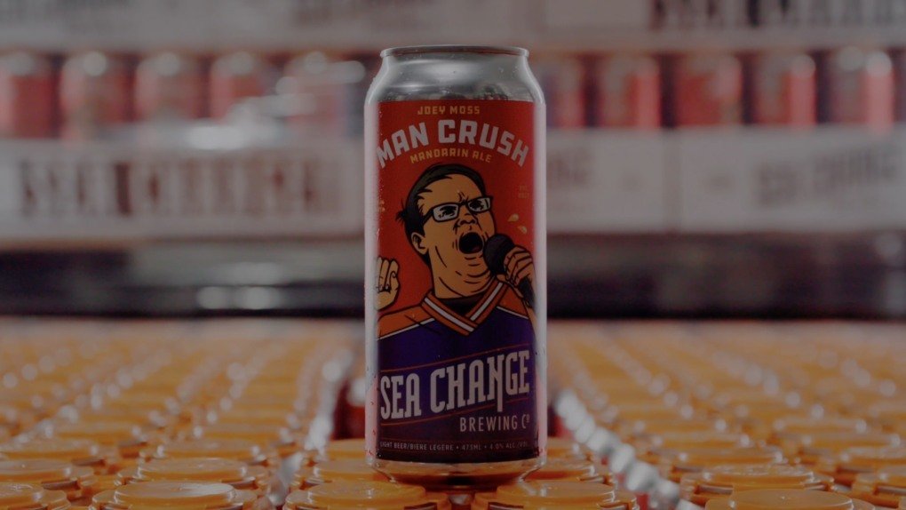 Starting tomorrow at 12 PM, the Limited-Edition Joey Moss - Man Crush Mandarin Ale 🍊 will be available at @seachangebrewingco taprooms. For each 4-pack sold, $1 is contributed to the Winnifred Stewart Joey Moss Memorial Fund. Grab your chance to sup