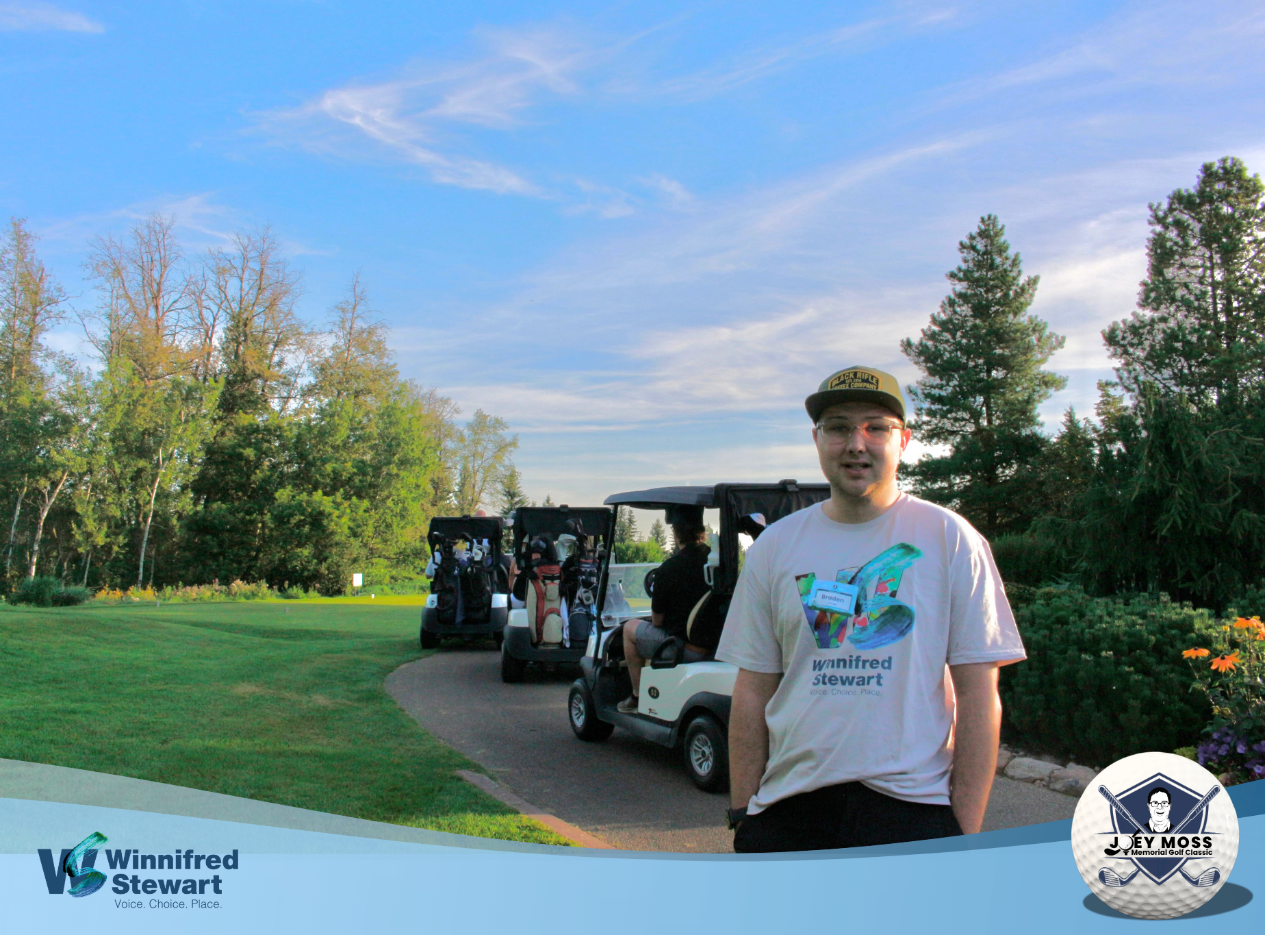 Braden behind golf carts.png
