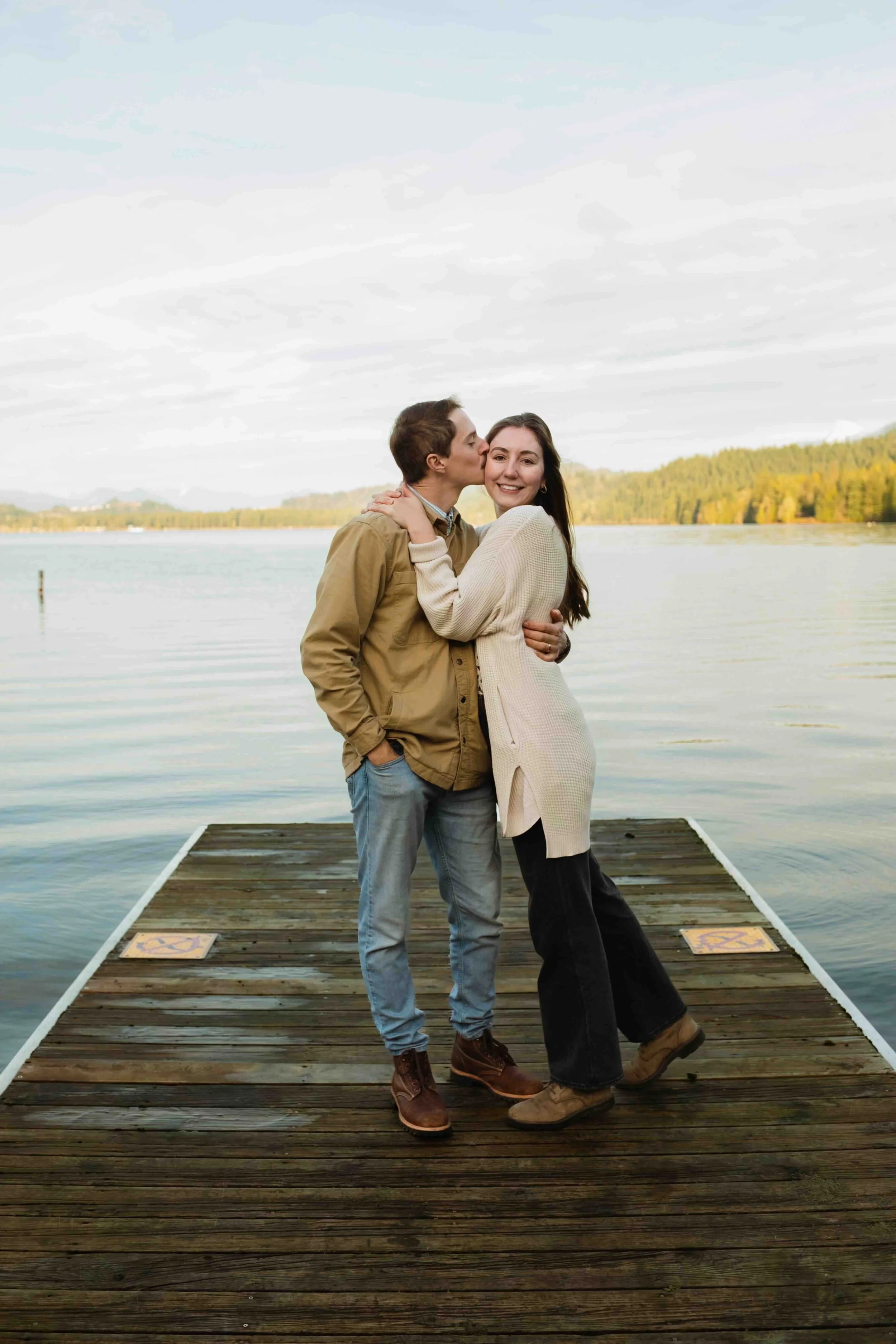Vancouver man casually kisses his wife on Cultus lake dock