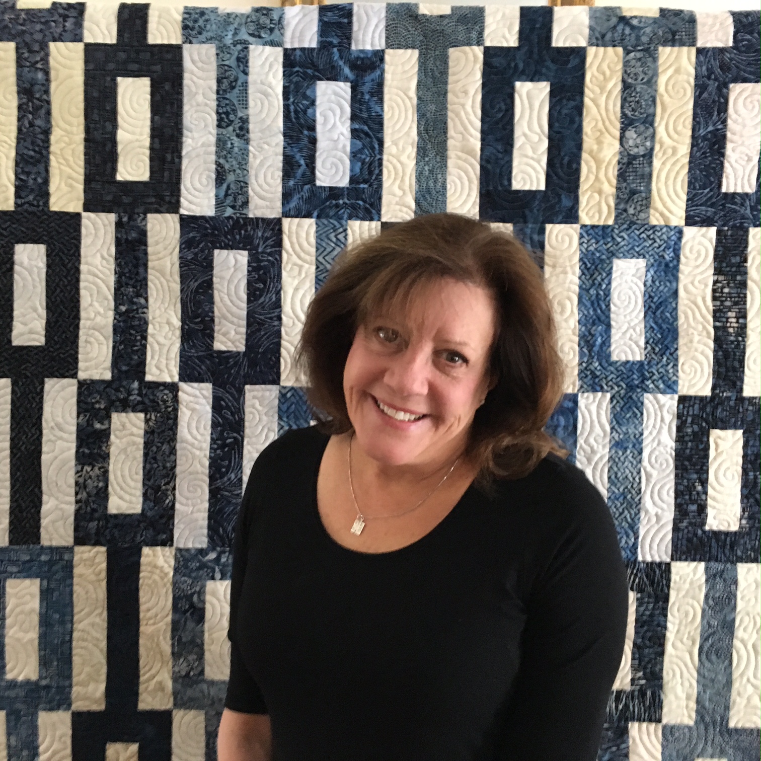  Dona McKenzie dona@silverliningquilts.com