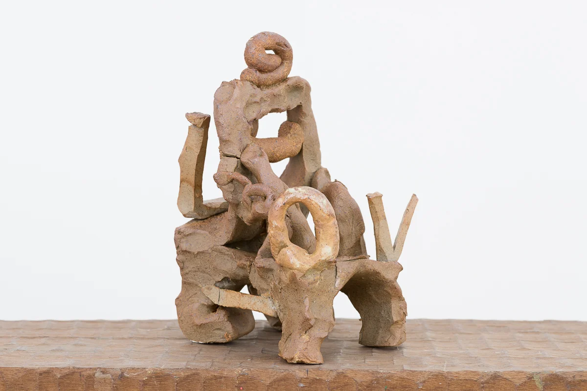 Miniature chair with the letters l,o,v,e, ceramic, West Sussex 2015.