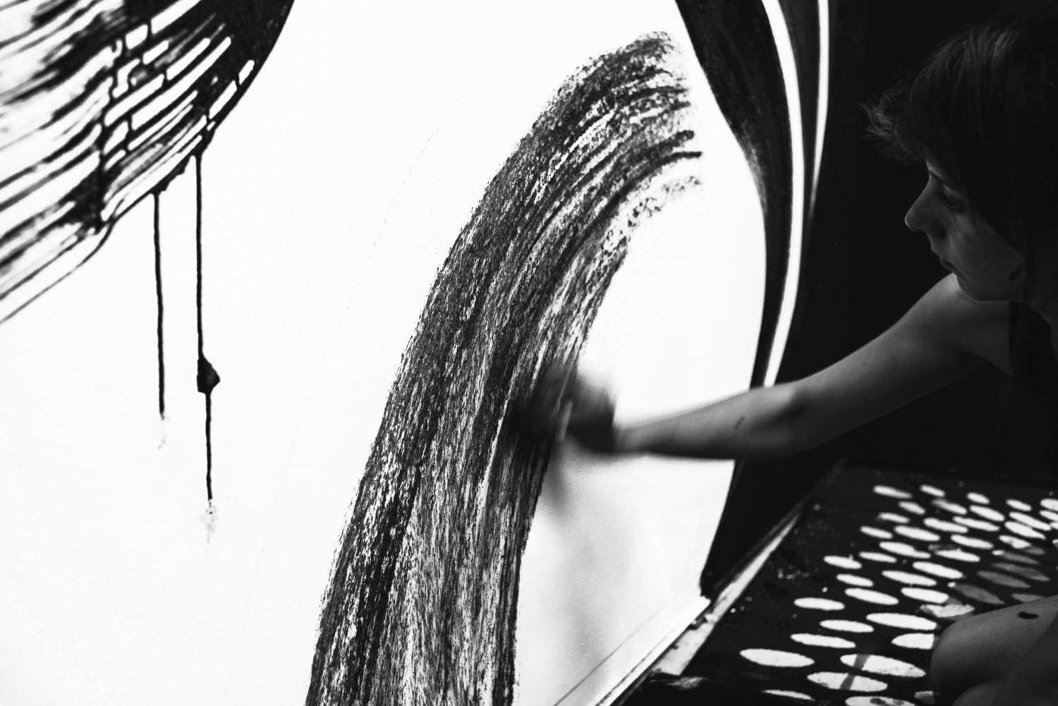 A combination of chalk and charcoal, to be washed off so that nothing remains.