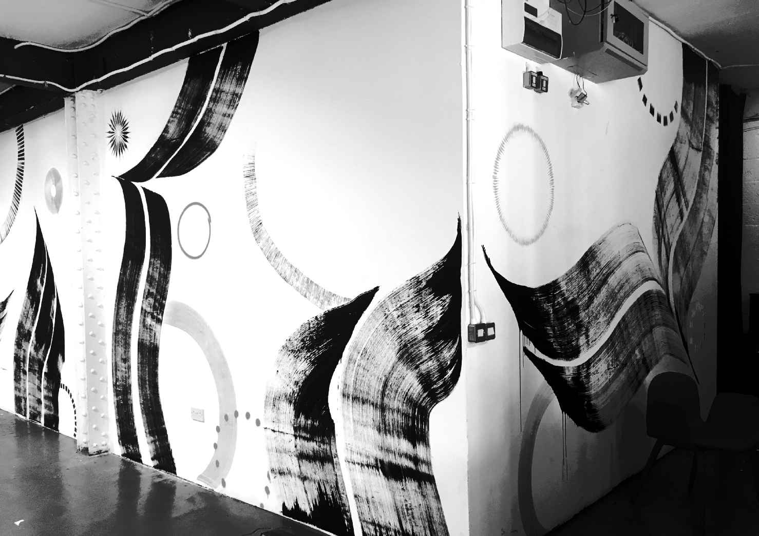 Installation views inside the gallery which stands alongside the canal.
