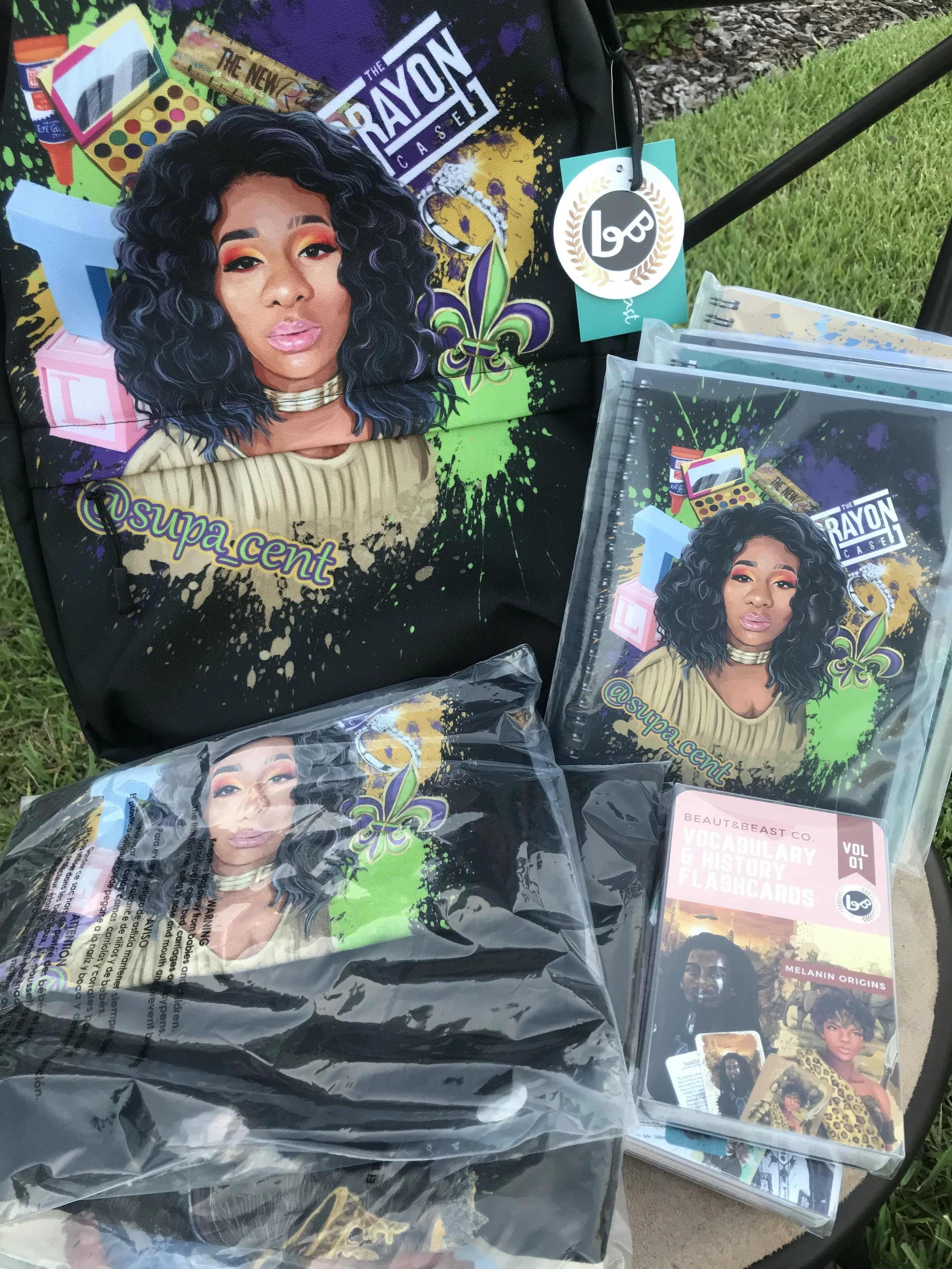 Custom backpack, mini notebook, and t-shirt I created for Supa Cent prior to going to see her.