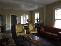 Sunny living room and music salon.