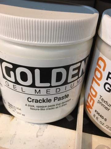 I was also intrigued by this crackle paste that you mix with colored paint and when it dries, it cracks for some serious texture.