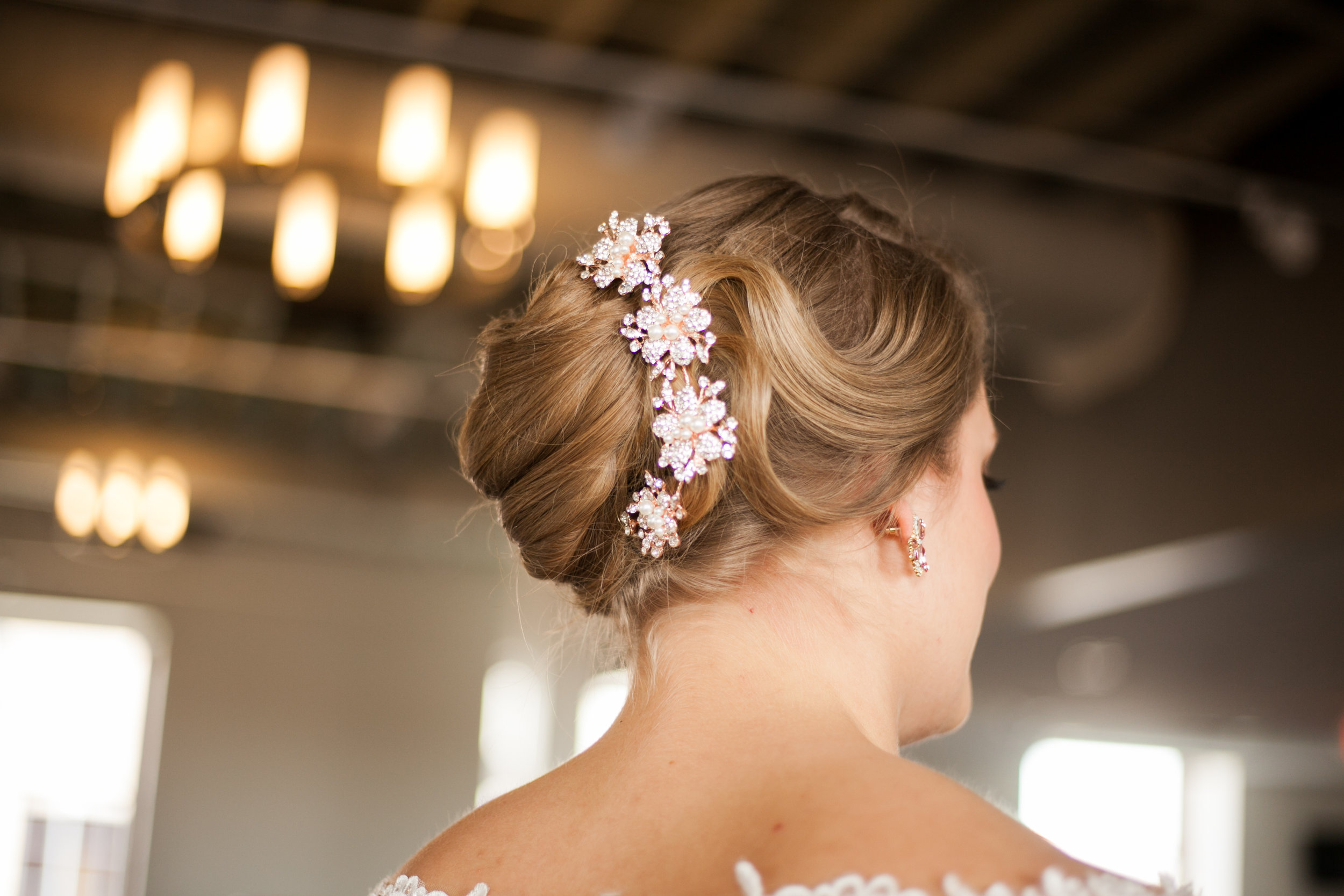 Hairstylist in Toledo, Ohio. Bridal Hair and Makeup at Hensville in Downtown Toledo, OH. Makeup by Amy Lewis & Co. 1..JPG