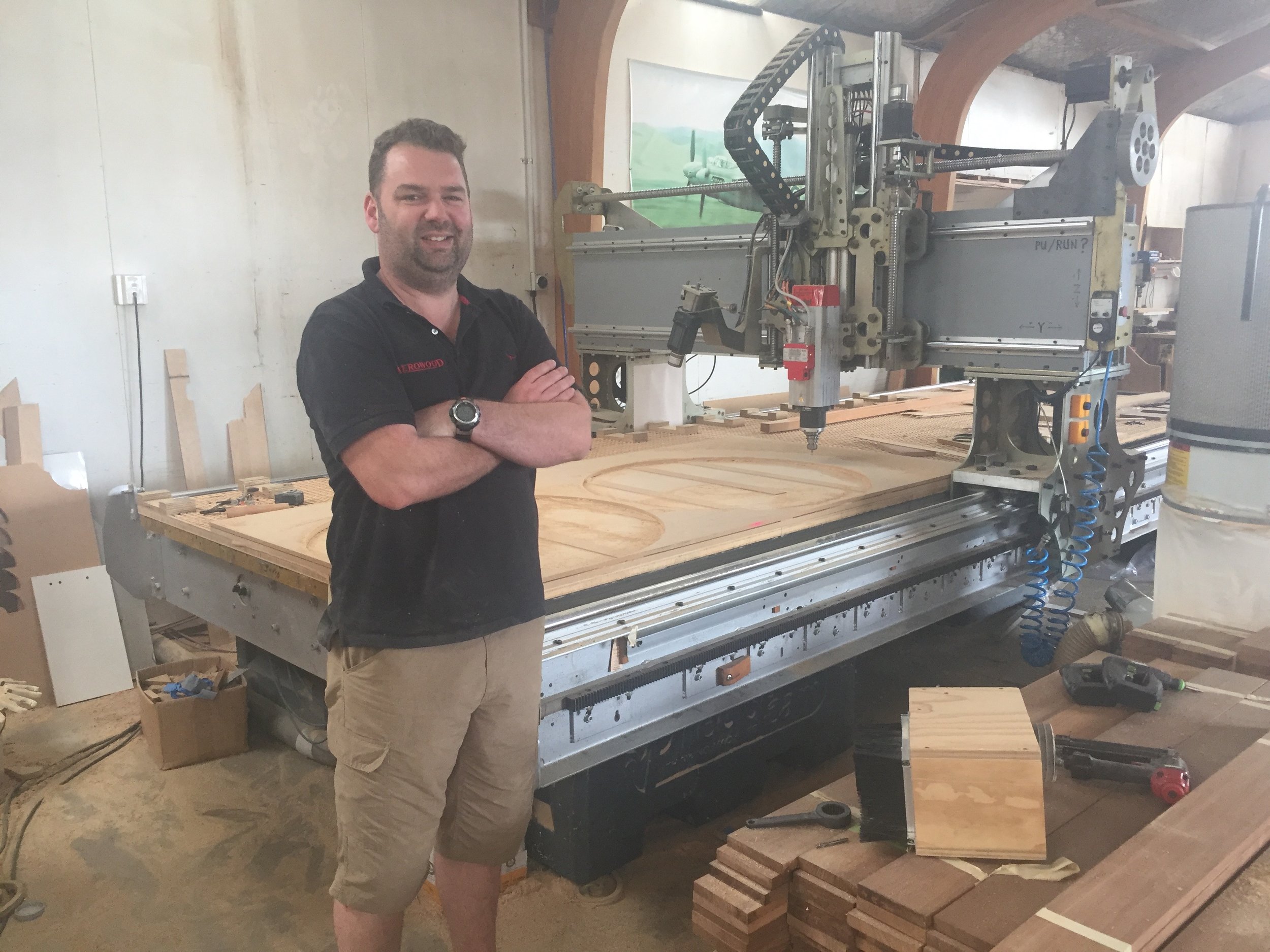 Corin showed me the CNC cutter where he made my disks - see those big circles? That's where he cut the disks for my two BIG pieces