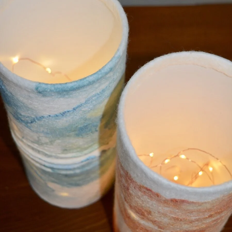 the fibre artwork is illuminated with seed lights