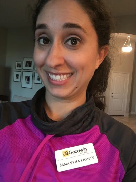 Here is me trying on my brand new name tag! 