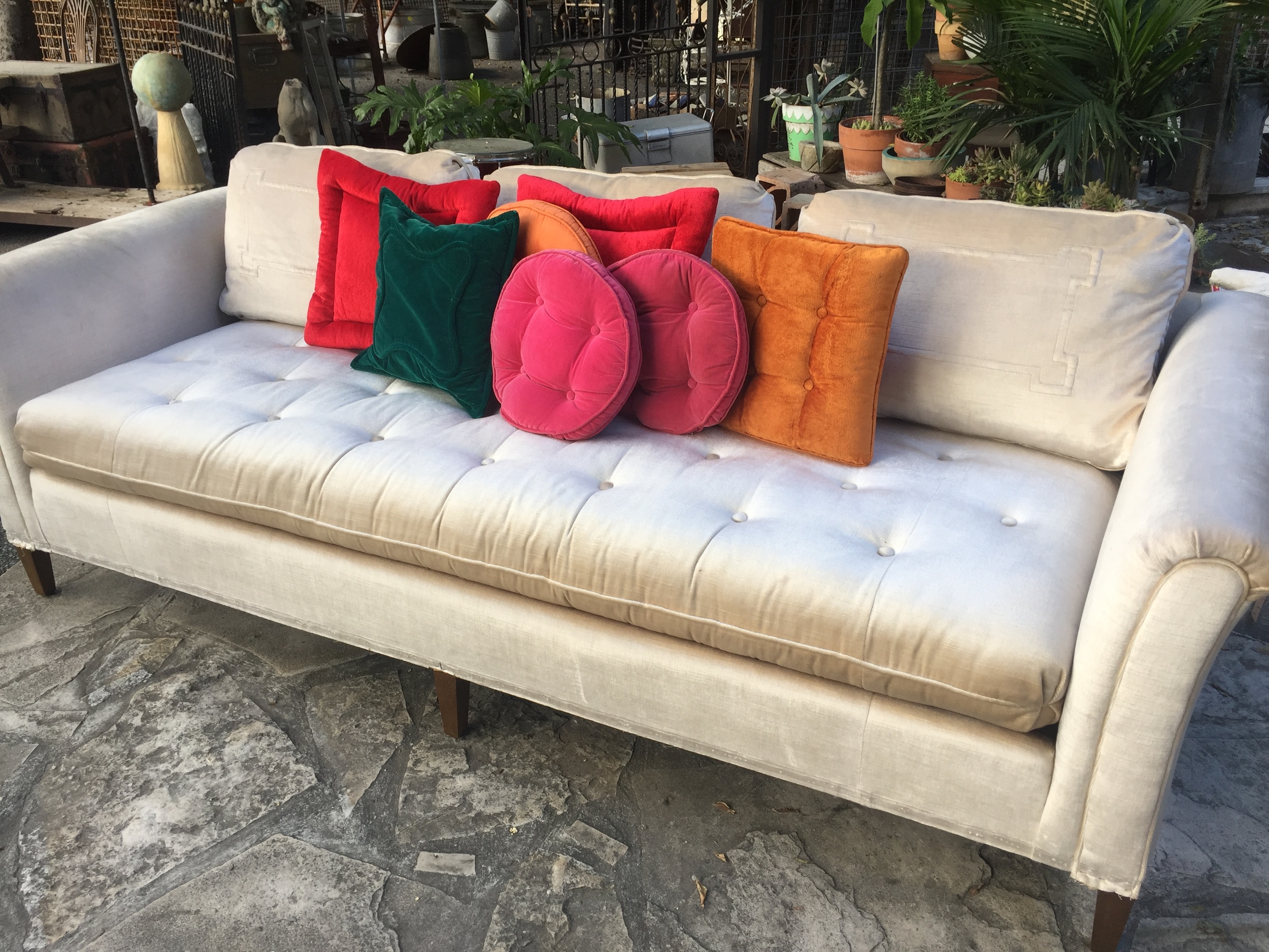 With a pop of colorful pillows.