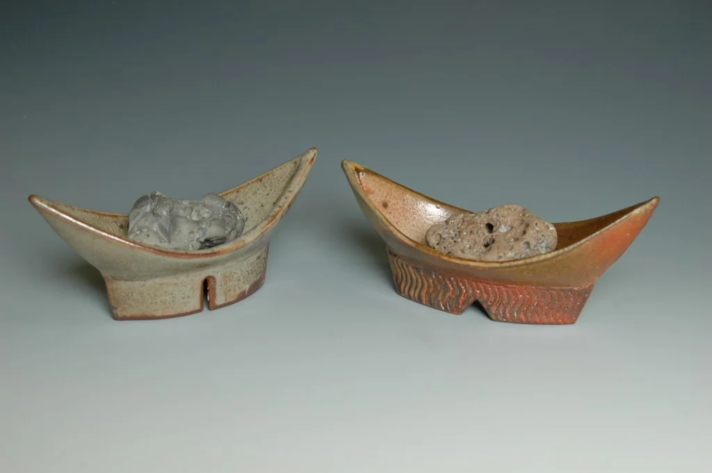 Two Little Boats with Stones