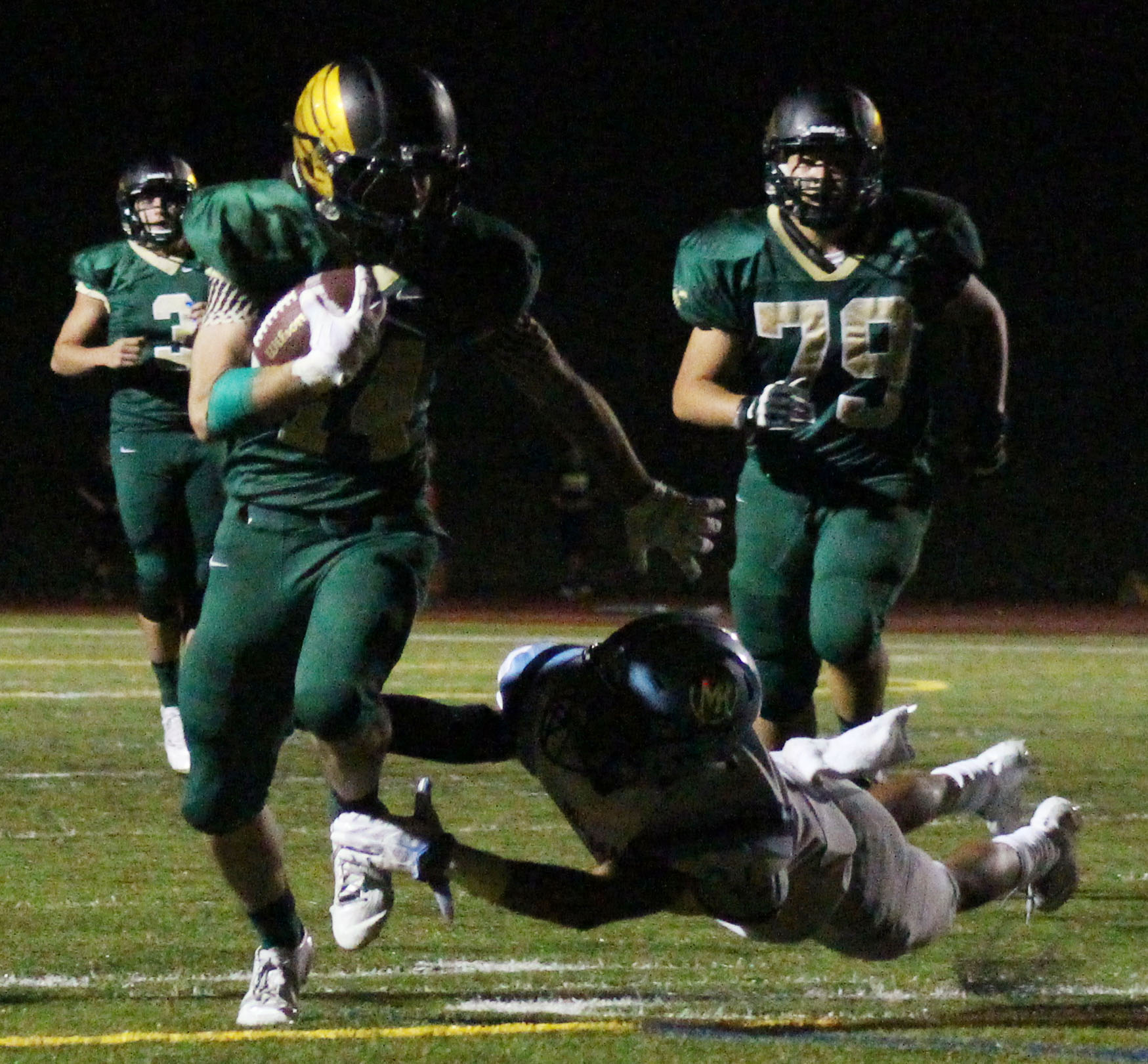 Junior Michael Rizzo runs in his second touchdown of the night against Mountain Range.