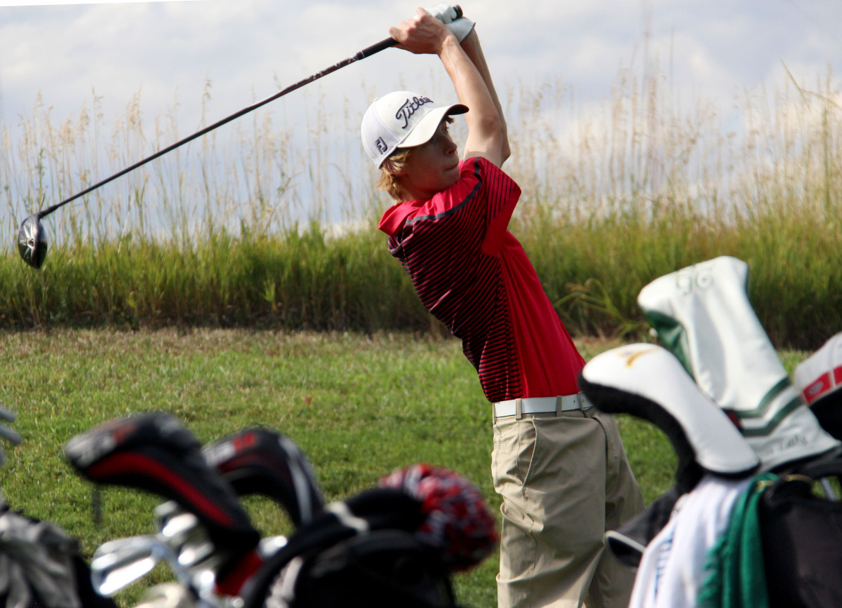 Senior Cameron Chapman tees off during practice at the Links. Chapman was one of the four qualifying players for the state team, which took eighth overall.
