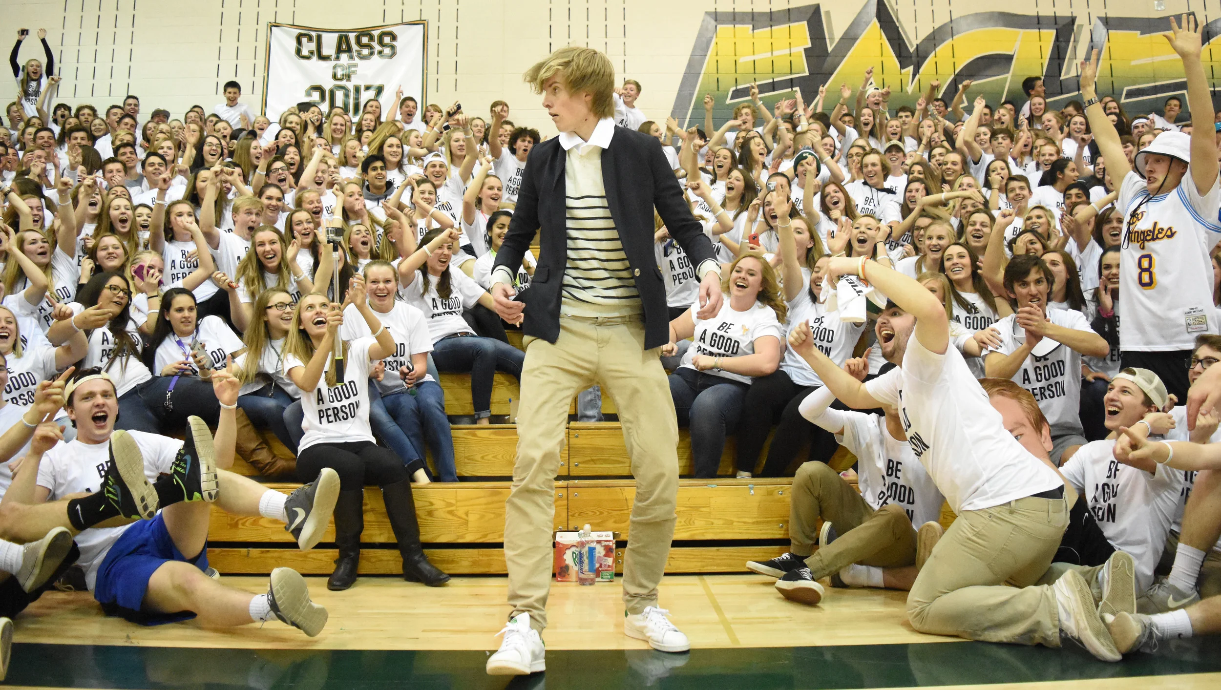 Senior Ben Holland emerges from the back of the Mountain Vista student section dressed like Ellen DeGeneres to shade the ThunderRidge students, who attempted to get Ellen to join in the school's Field Day activities in 2015, during halftime of the rivalry basketball game. Published February 2016, Vista Now