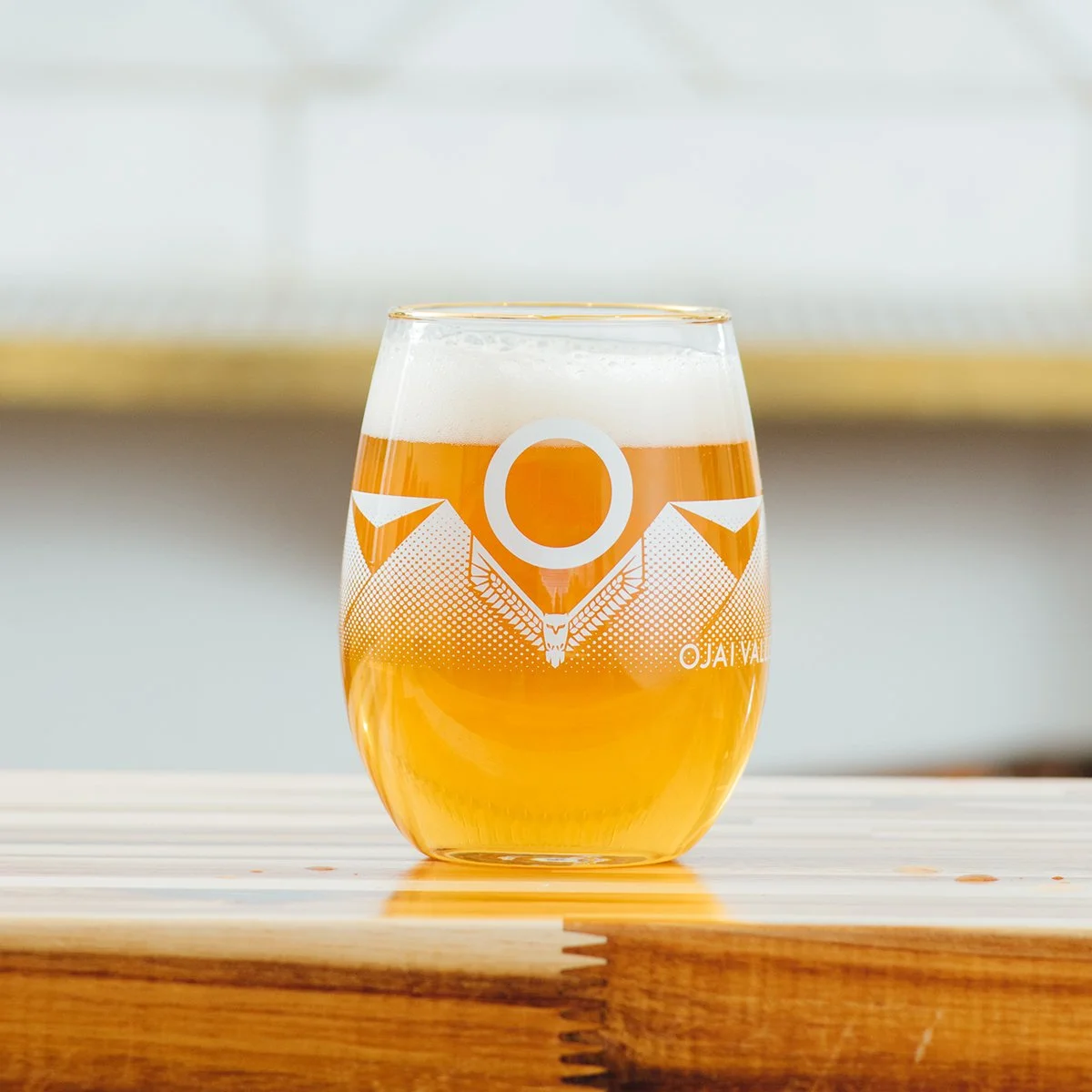 Belgian ale in glass on bar