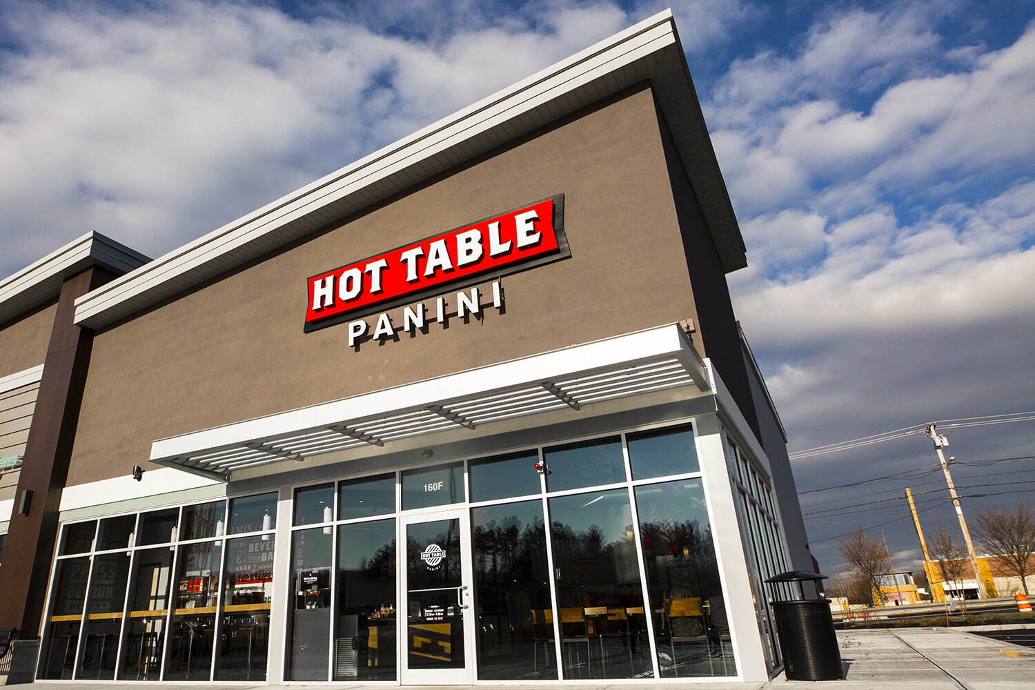  Identity and graphic design for a small fast casual chain, including signage, interior graphics, and menu boards. 