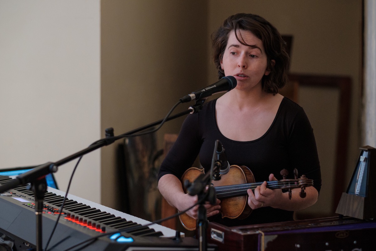 Photo of me by Robert Catto performing in Urza and the Song in the Dark .